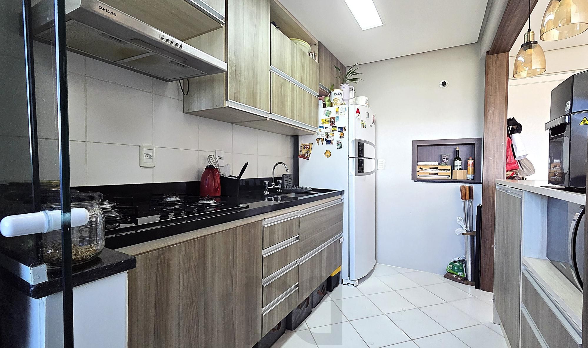 Apartamento semi mobiliado com 3 dormitórios transformados em 2, sendo 1 suíte e 1 vaga de garagem. — foto 8