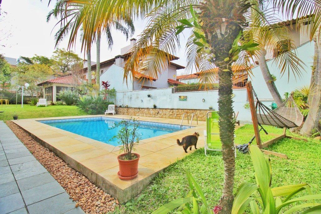 Casa em Porto Alegre, no bairro Jardim Isabel, com 4 dormitório(s), e 4 banheiro — foto 36