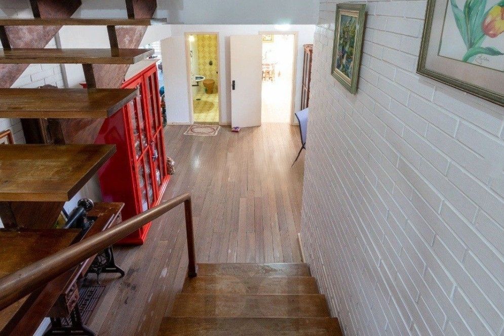 Excelente casa com 5 dormitórios, 2 suítes, 3 vagas de garagem e uma vista perene para o por do sol no Guaiba. — foto 13