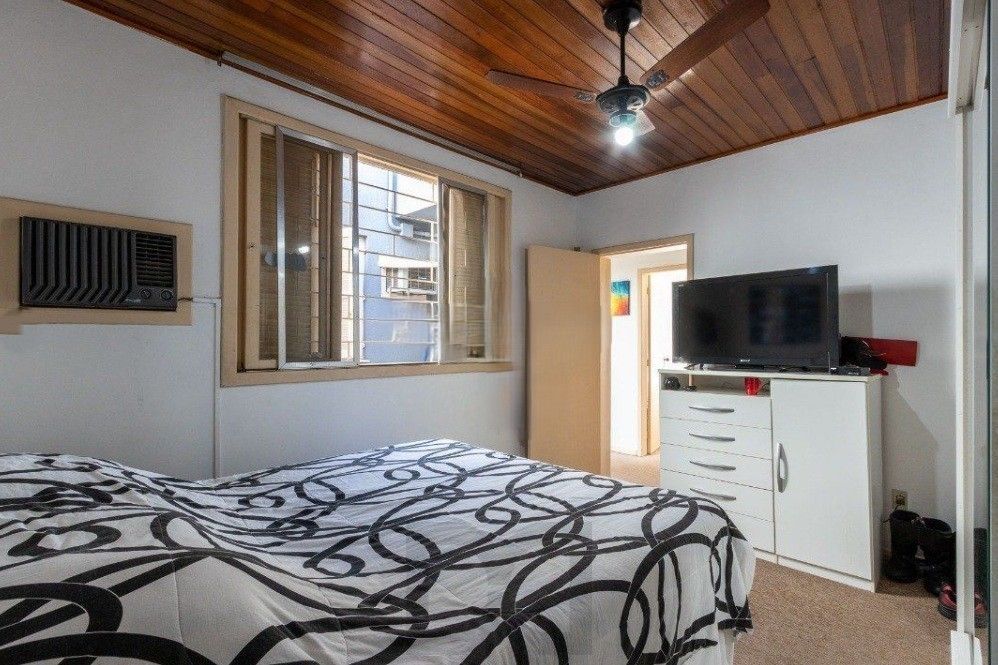 Excelente casa com 5 dormitórios, 2 suítes, 3 vagas de garagem e uma vista perene para o por do sol no Guaiba. — foto 37