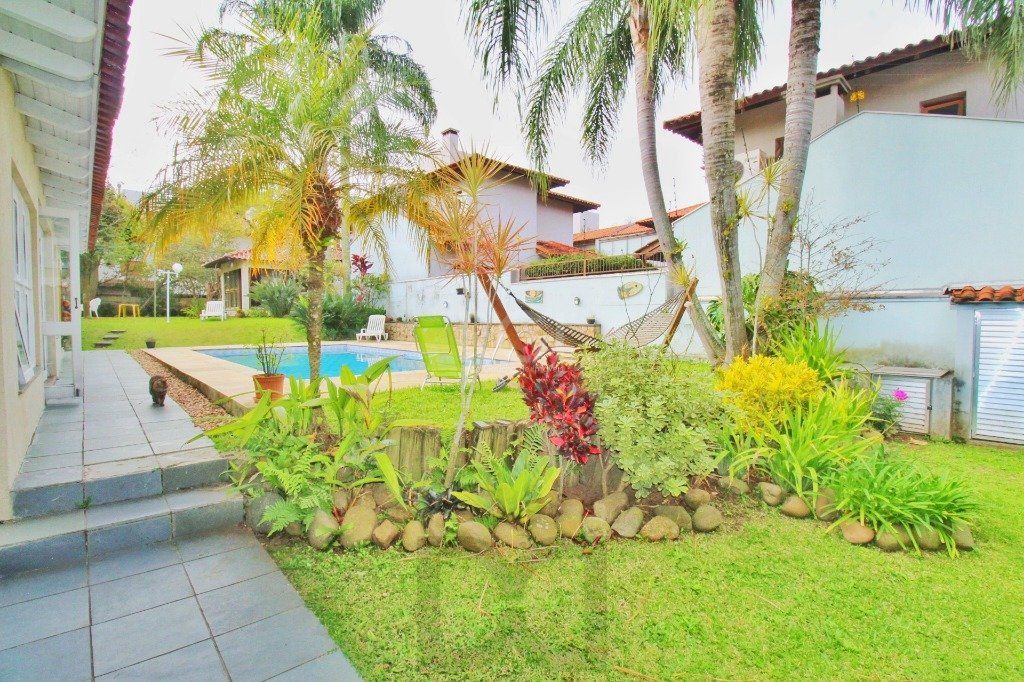 Casa em Porto Alegre, no bairro Jardim Isabel, com 4 dormitório(s), e 4 banheiro — foto 31