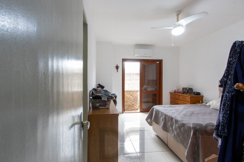 Casa em condomínio com 3 dormitórios, vaga coberta, churrasqueira - Bairro Camaquã — foto 25