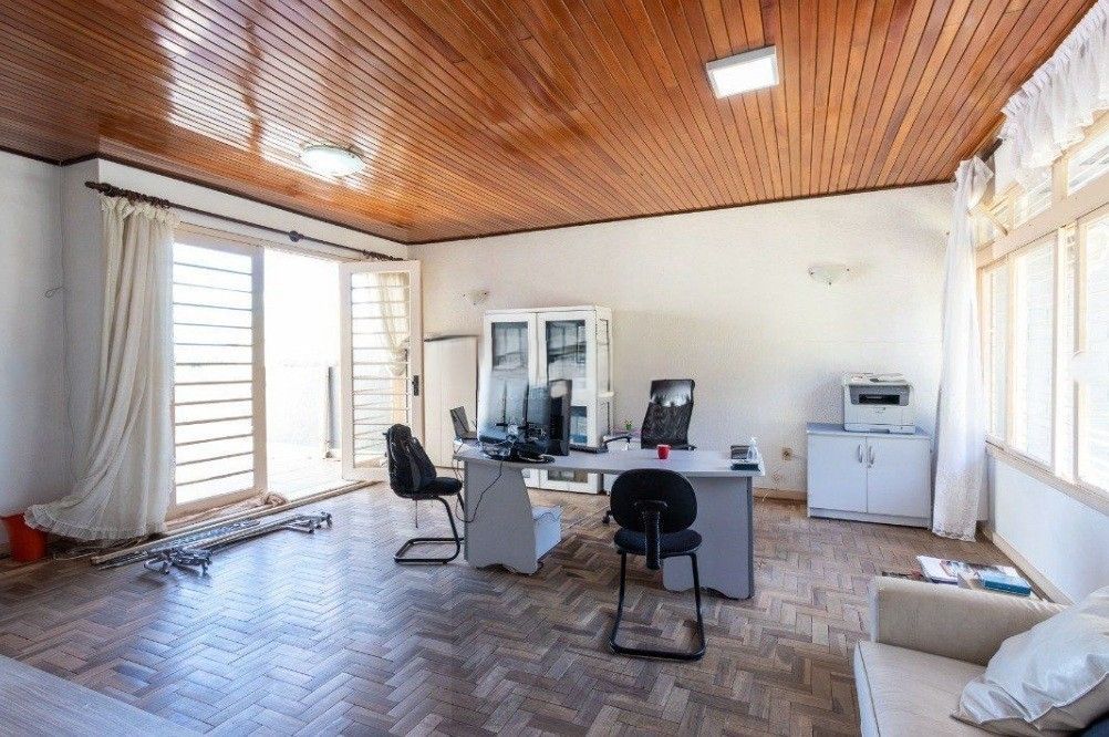 Excelente casa com 5 dormitórios, 2 suítes, 3 vagas de garagem e uma vista perene para o por do sol no Guaiba. — foto 7