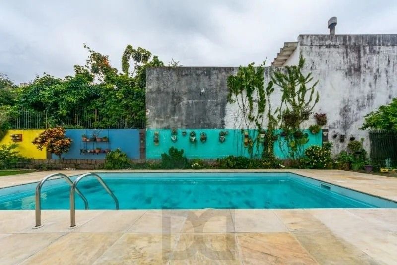 Belíssima casa de esquina, em estilo colonial com 277m2 de área privativa, terreno com 1014m2, 4 dormitórios e 3 suítes. — foto 9