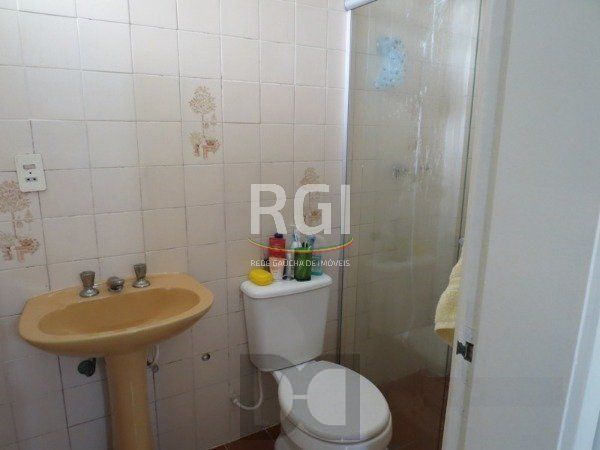 Excelente Residência em condomínio no Bairro Santo Antônio, com 3 dormitórios. — foto 17