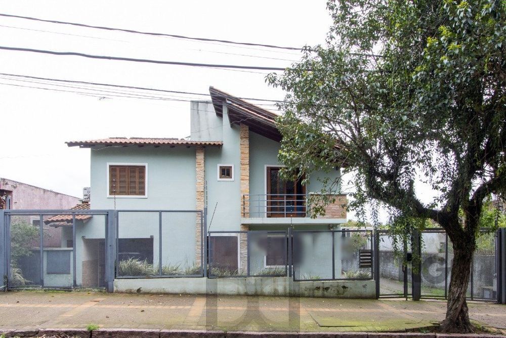 Casa em condomínio com 3 dormitórios, vaga coberta, churrasqueira - Bairro Camaquã — foto 1