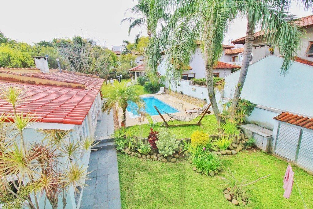 Casa em Porto Alegre, no bairro Jardim Isabel, com 4 dormitório(s), e 4 banheiro — foto 38