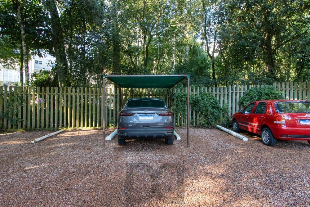 Casa em condomínio, com 3 quartos, com suíte, 2 vagas cobertas, churrasqueira, no Bairro Nonoai. — foto 32