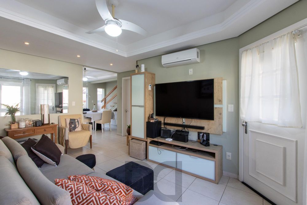 Casa em condomínio, com 3 quartos, com suíte, 2 vagas cobertas, churrasqueira, no Bairro Nonoai. — foto 4