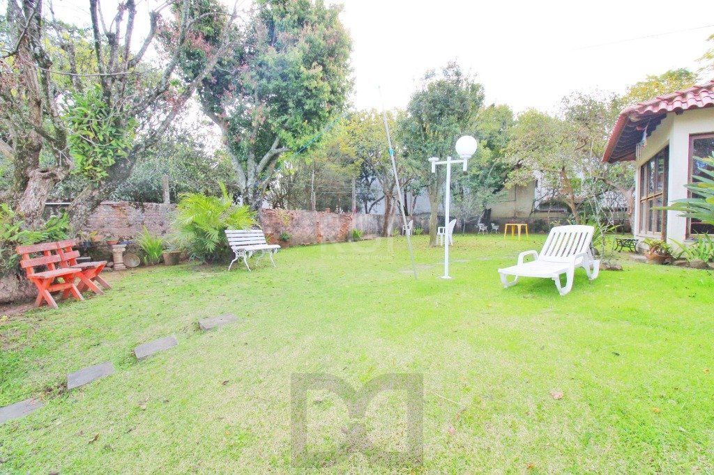 Casa em Porto Alegre, no bairro Jardim Isabel, com 4 dormitório(s), e 4 banheiro — foto 32