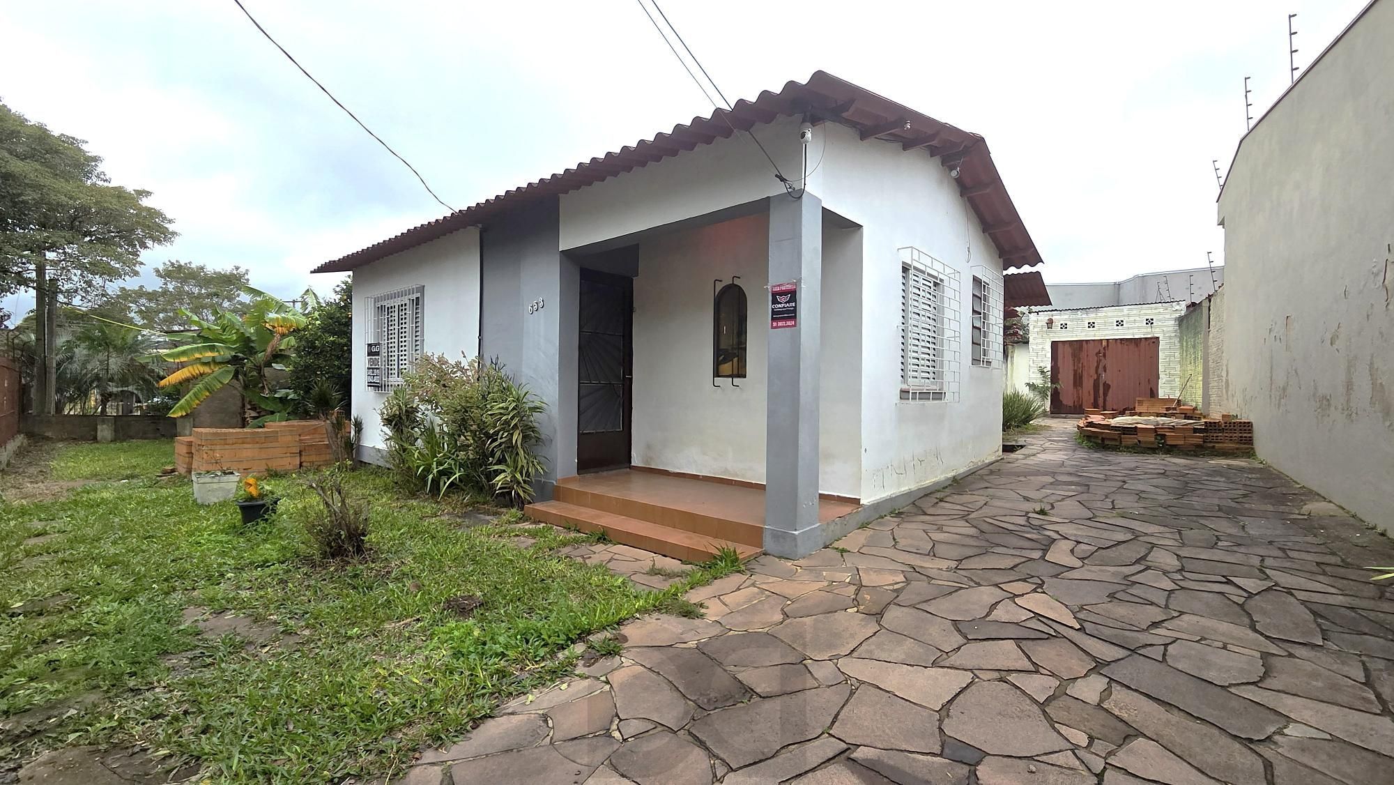 Casa 2 dormitórios, 90m² de área privativa e terreno com 358m2, amplo pátio e 3 vagas de garagem no bairro Camaquã – Porto Alegre — foto 1