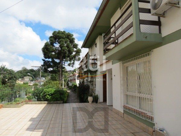 Excelente Residência em condomínio no Bairro Santo Antônio, com 3 dormitórios. — foto 18