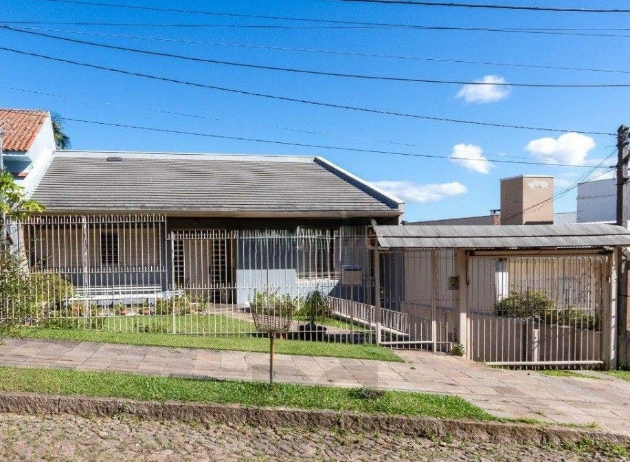 Excelente casa com 5 dormitórios, 2 suítes, 3 vagas de garagem e uma vista perene para o por do sol no Guaiba. — foto 2