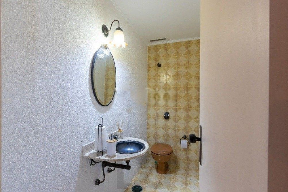 Excelente casa com 5 dormitórios, 2 suítes, 3 vagas de garagem e uma vista perene para o por do sol no Guaiba. — foto 17