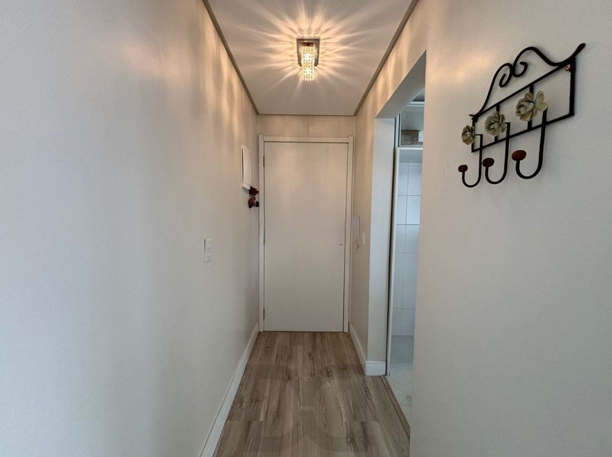 Apartamento com 2 dormitórios sendo 1 suíte, com churrasqueira e vaga coberta. — foto 24