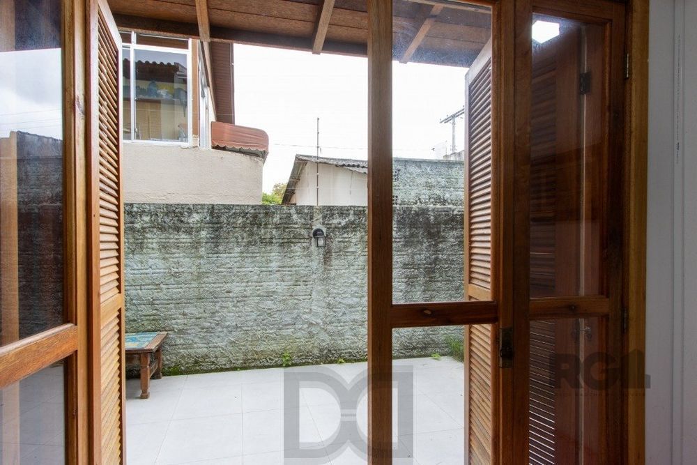 Casa em condomínio com 3 dormitórios, vaga coberta, churrasqueira - Bairro Camaquã — foto 11