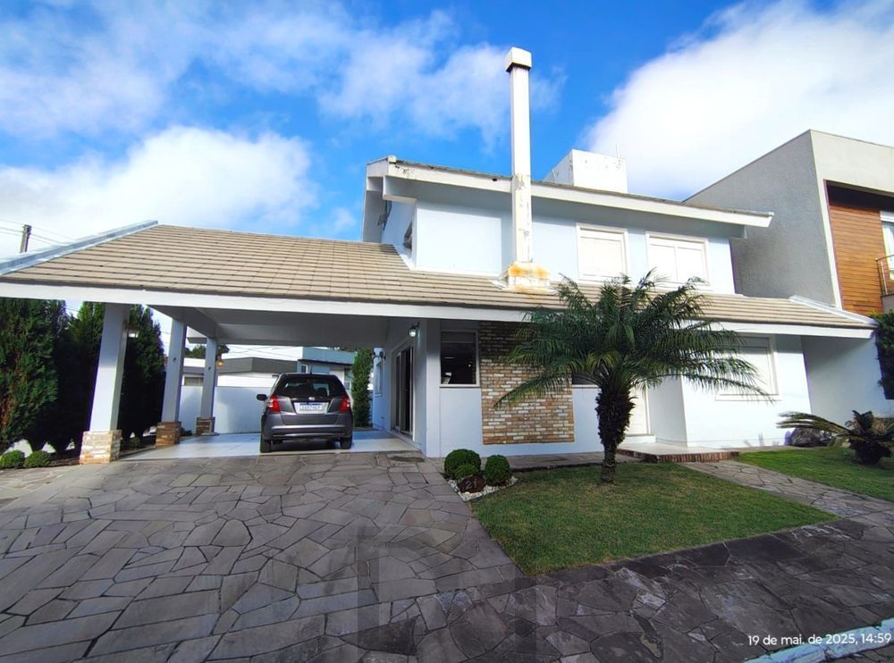 Casa 4 dormitórios, condomínio fechado, zona sul de POA-RS. — foto 1