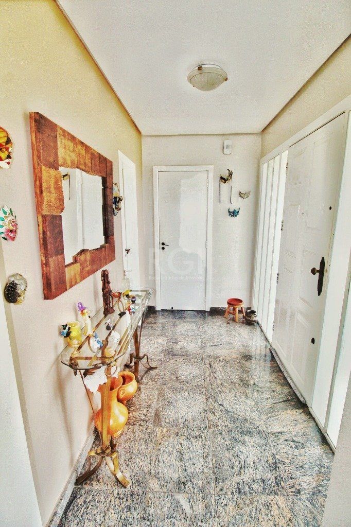 Casa em Porto Alegre, no bairro Jardim Isabel, com 4 dormitório(s), e 4 banheiro — foto 5