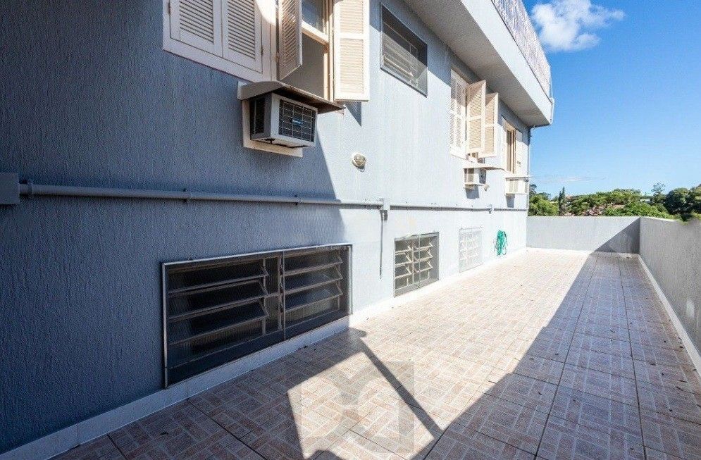 Excelente casa com 5 dormitórios, 2 suítes, 3 vagas de garagem e uma vista perene para o por do sol no Guaiba. — foto 49