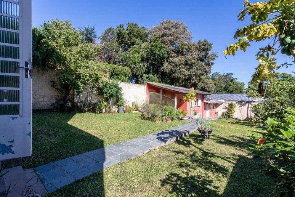Excelente casa com 5 dormitórios, 2 suítes, 3 vagas de garagem e uma vista perene para o por do sol no Guaiba. — foto 50