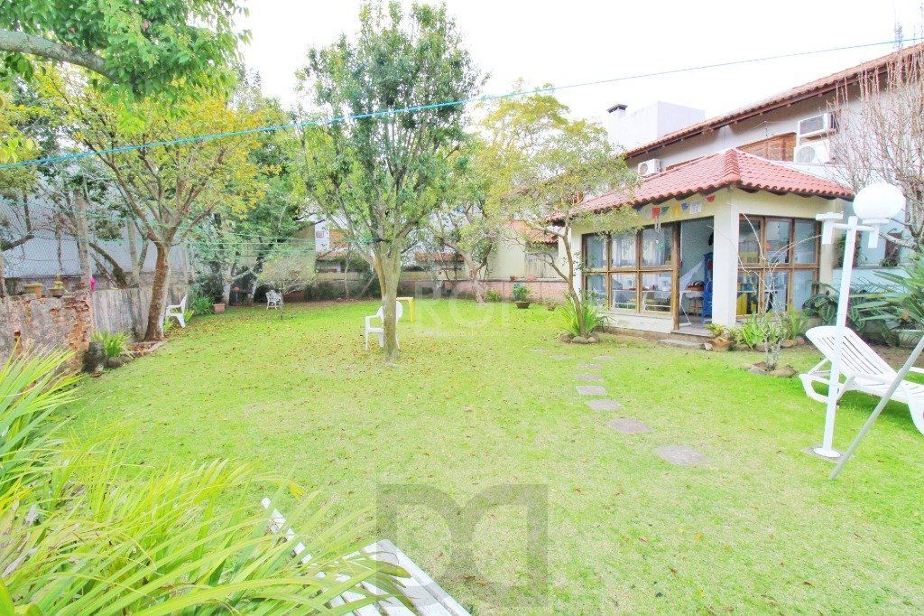 Casa em Porto Alegre, no bairro Jardim Isabel, com 4 dormitório(s), e 4 banheiro — foto 29