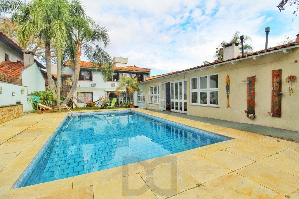 Casa em Porto Alegre, no bairro Jardim Isabel, com 4 dormitório(s), e 4 banheiro — foto 35