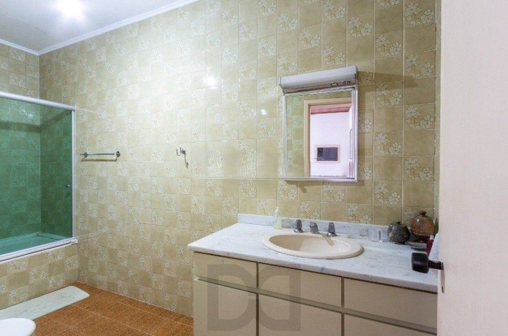 Excelente casa com 5 dormitórios, 2 suítes, 3 vagas de garagem e uma vista perene para o por do sol no Guaiba. — foto 38