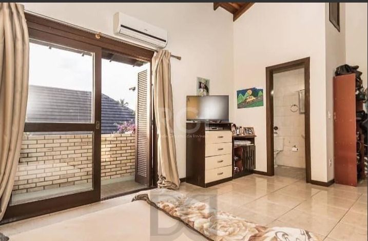 Casa em condomínio Fechado no Bairro Ipanema c/3 dormitórios. — foto 13