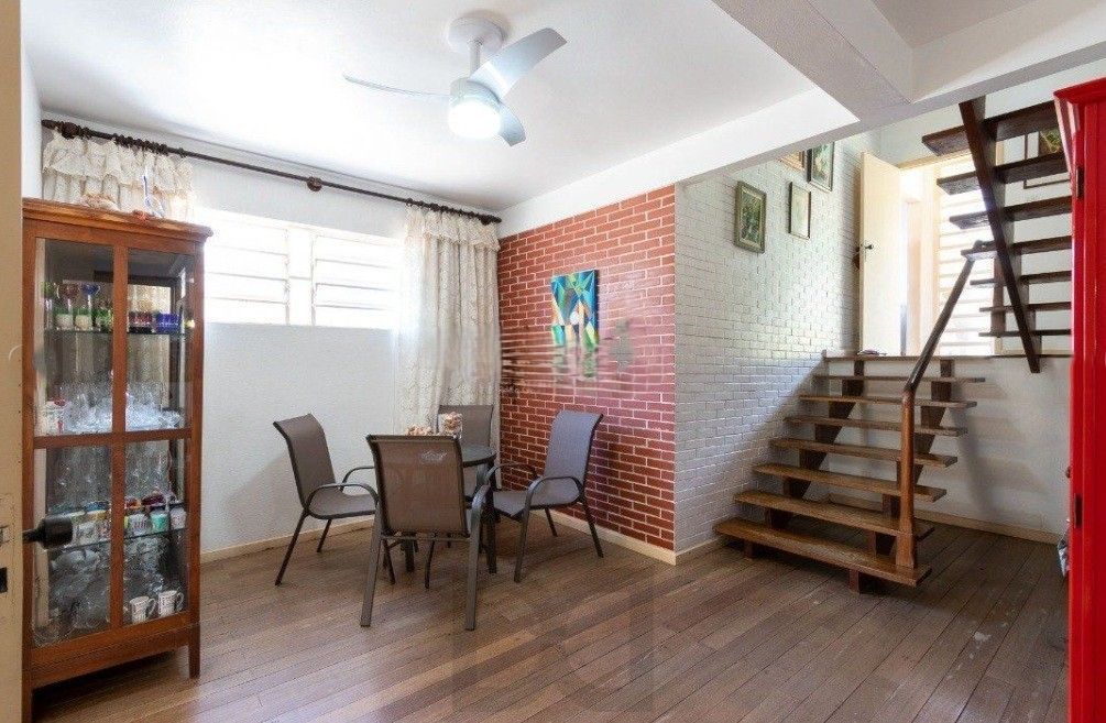 Excelente casa com 5 dormitórios, 2 suítes, 3 vagas de garagem e uma vista perene para o por do sol no Guaiba. — foto 16