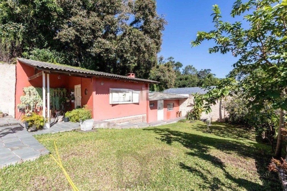 Excelente casa com 5 dormitórios, 2 suítes, 3 vagas de garagem e uma vista perene para o por do sol no Guaiba. — foto 52