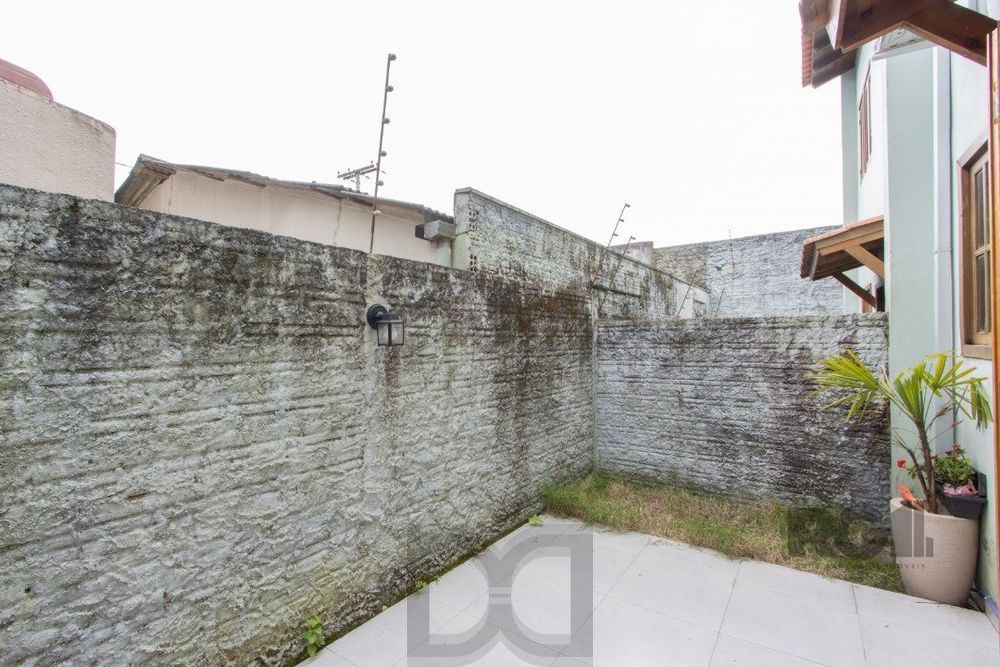 Casa em condomínio com 3 dormitórios, vaga coberta, churrasqueira - Bairro Camaquã — foto 12