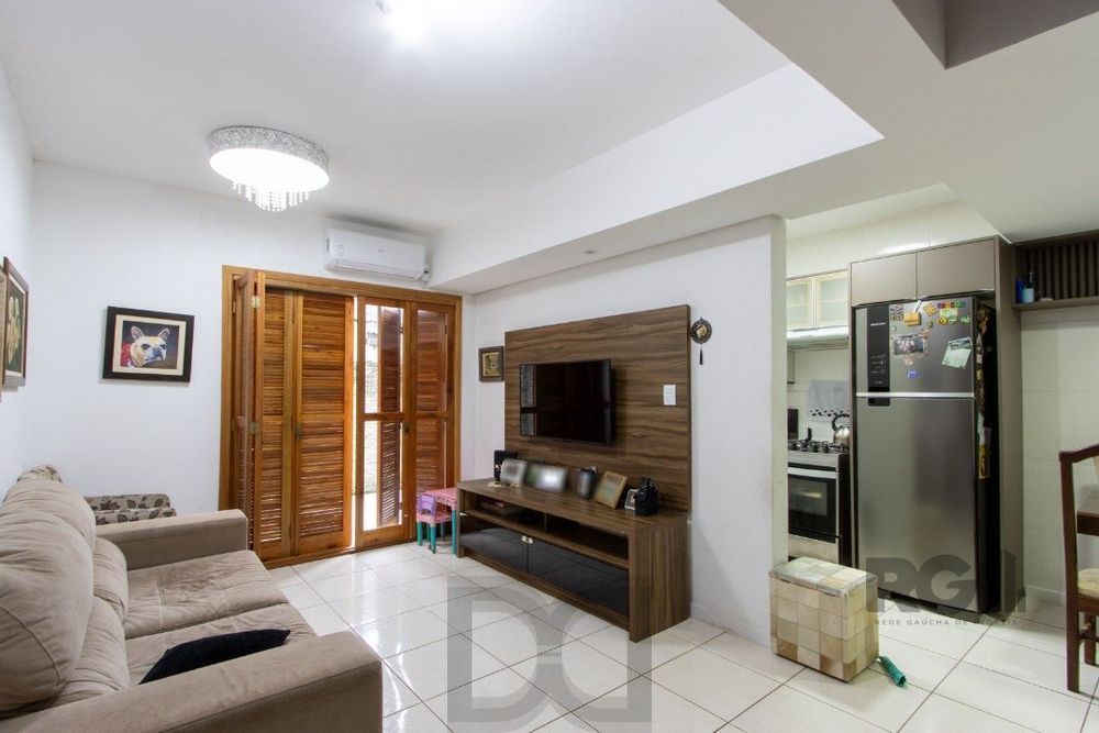 Casa em condomínio com 3 dormitórios, vaga coberta, churrasqueira - Bairro Camaquã — foto 32