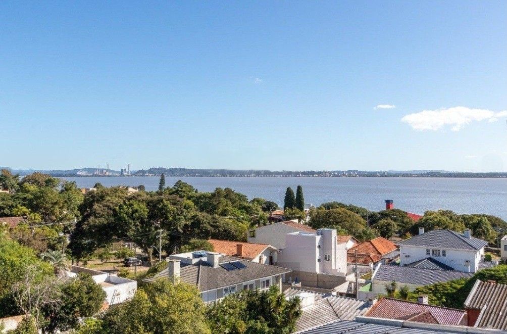 Excelente casa com 5 dormitórios, 2 suítes, 3 vagas de garagem e uma vista perene para o por do sol no Guaiba. — foto 59