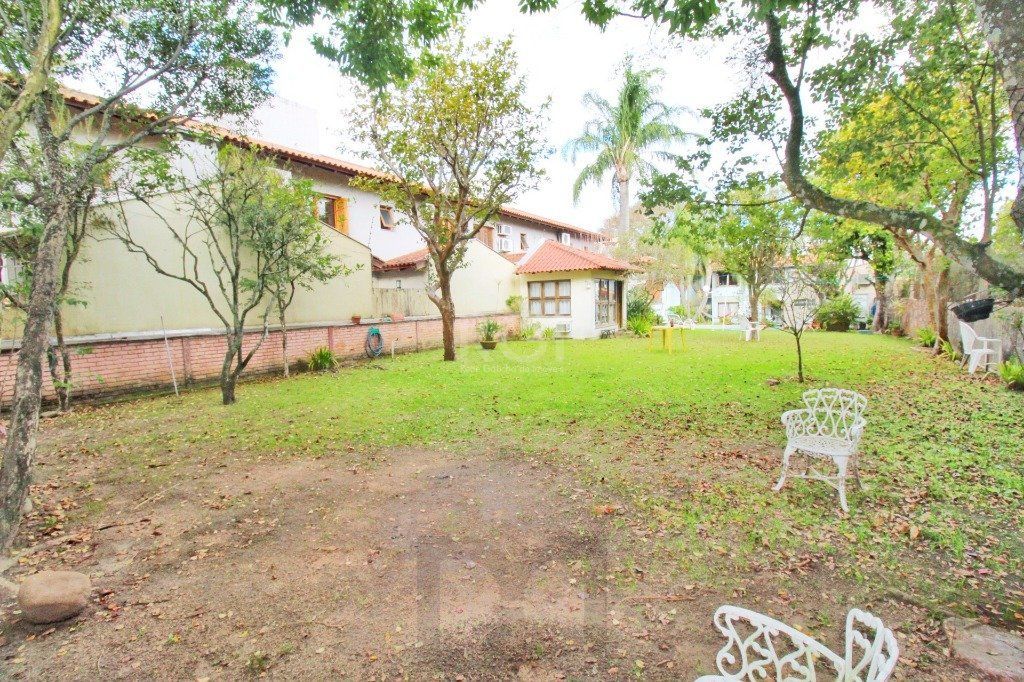 Casa em Porto Alegre, no bairro Jardim Isabel, com 4 dormitório(s), e 4 banheiro — foto 30