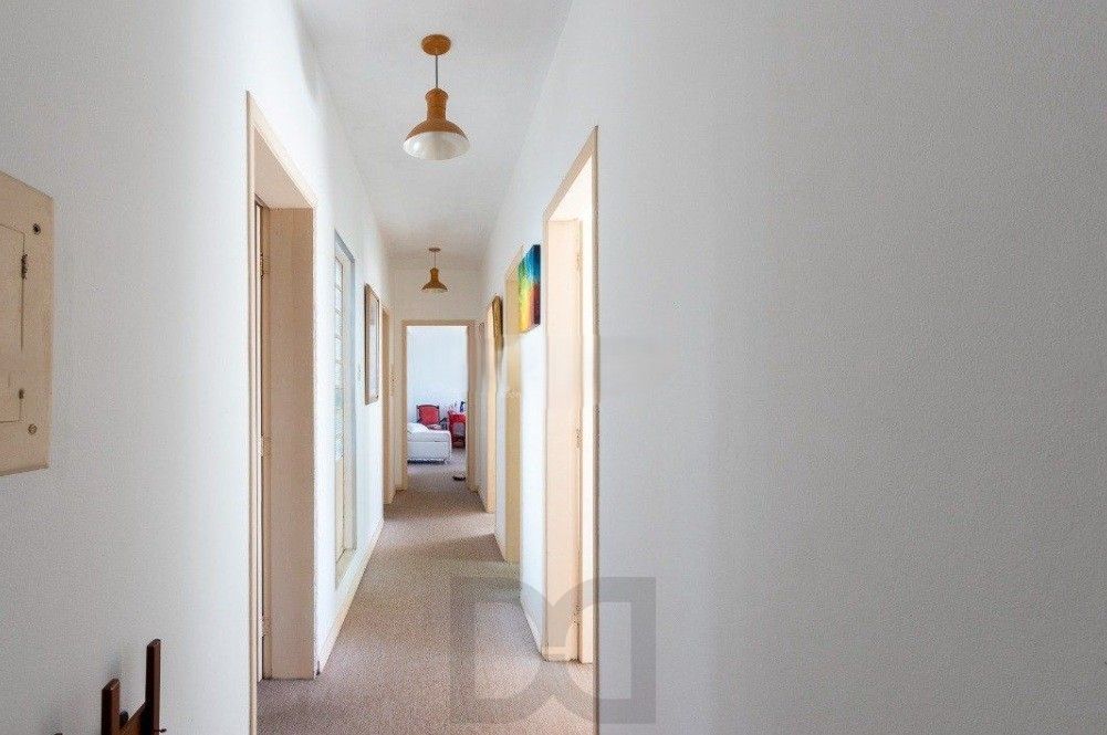 Excelente casa com 5 dormitórios, 2 suítes, 3 vagas de garagem e uma vista perene para o por do sol no Guaiba. — foto 33