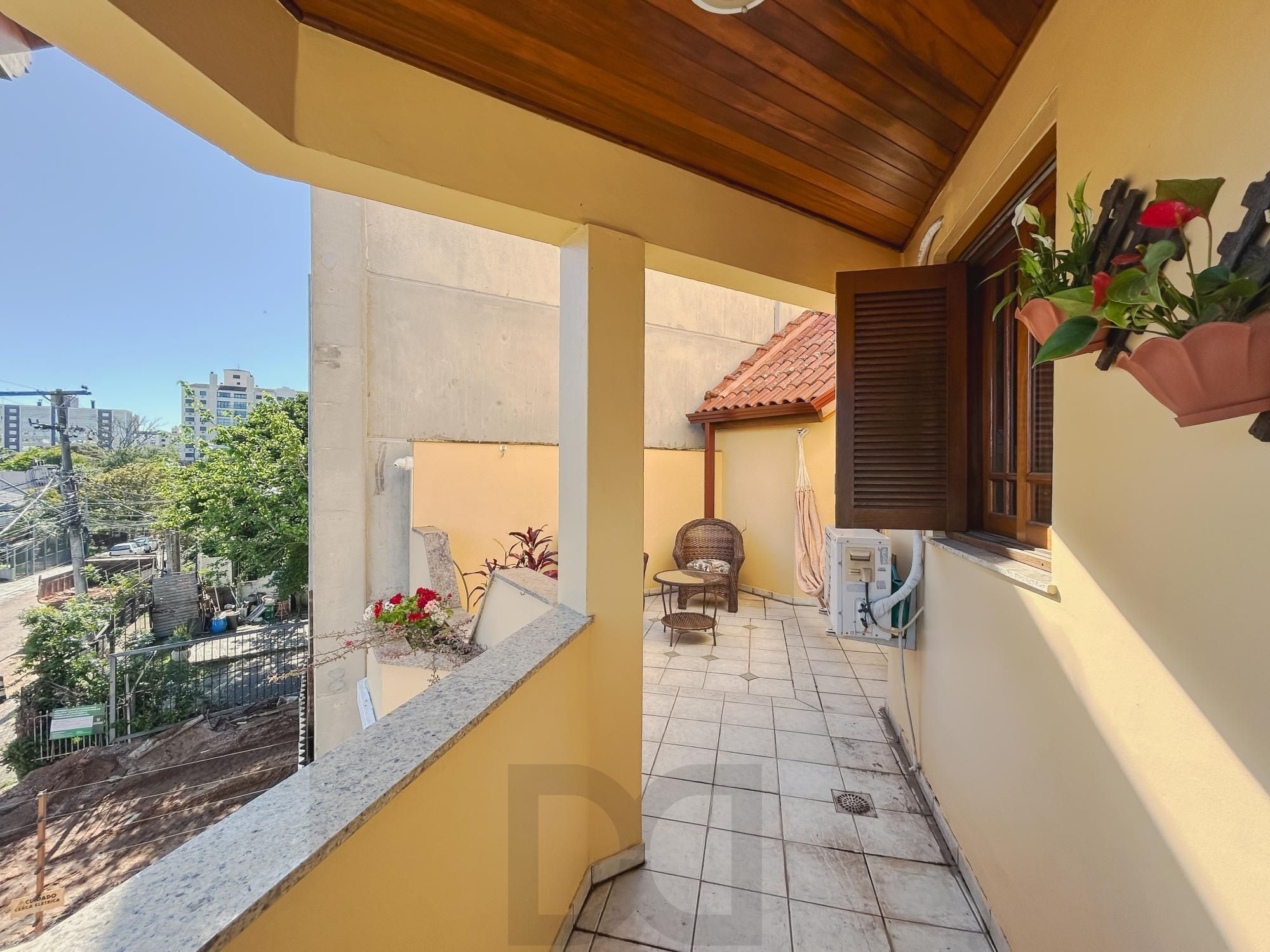 Casa com 4 suítes, piscina e área gourmet no bairro Tristeza. — foto 44