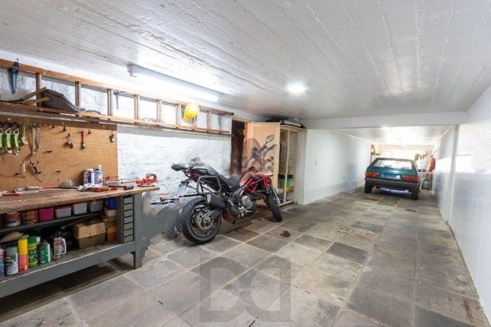 Excelente casa com 5 dormitórios, 2 suítes, 3 vagas de garagem e uma vista perene para o por do sol no Guaiba. — foto 57