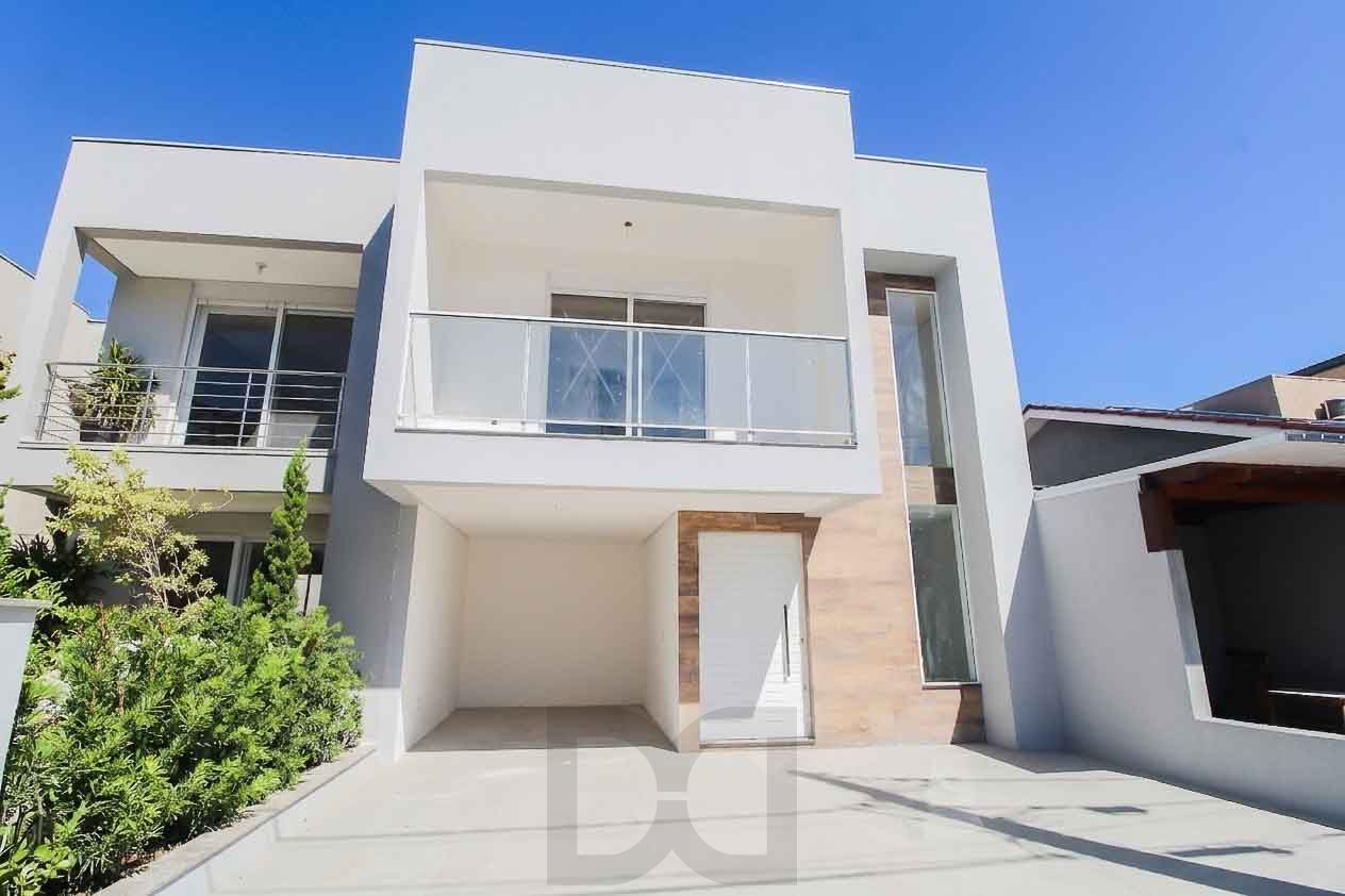 Casa em condomínio 4 D, sendo 1 dormitório, 168 m², garagem coberta — foto 2