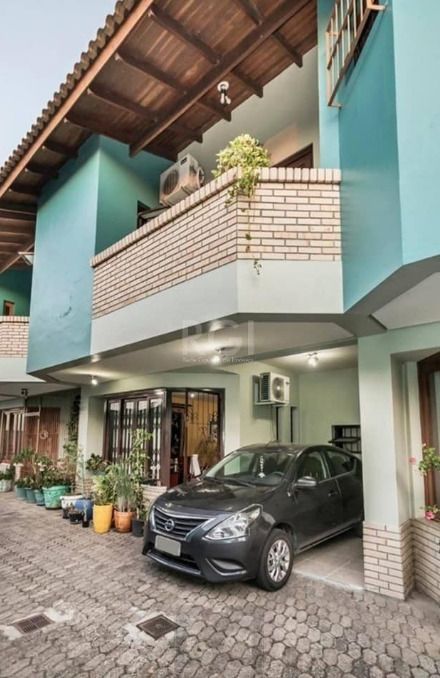 Casa em condomínio Fechado no Bairro Ipanema c/3 dormitórios. — foto 2