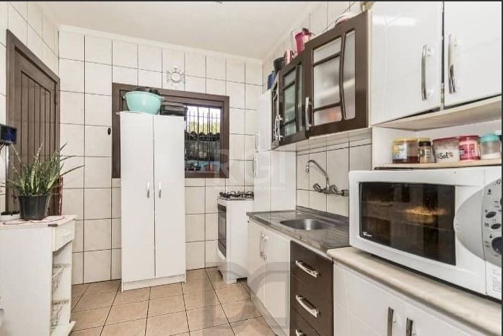 Casa em condomínio Fechado no Bairro Ipanema c/3 dormitórios. — foto 9