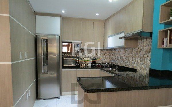 Excelente Residência em condomínio no Bairro Santo Antônio, com 3 dormitórios. — foto 15