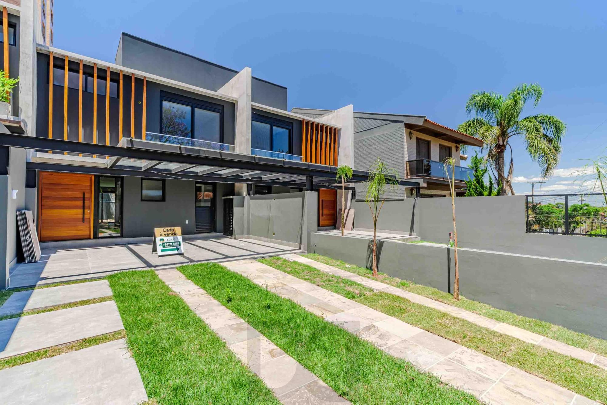 Casa contemporânea no bairro tristeza, 3 suítes, 4 vagas, amplo pátio — foto 1