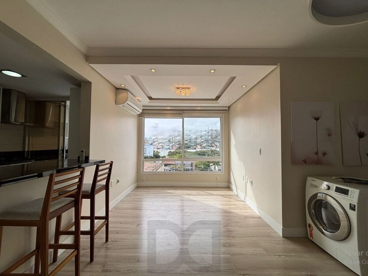 Apartamento com 2 dormitórios sendo 1 suíte, com churrasqueira e vaga coberta. — foto 1