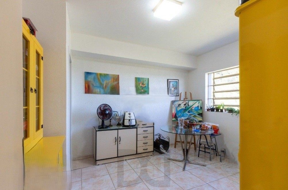 Excelente casa com 5 dormitórios, 2 suítes, 3 vagas de garagem e uma vista perene para o por do sol no Guaiba. — foto 29
