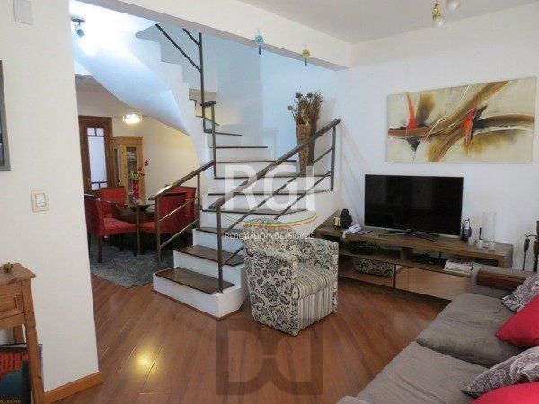 Excelente Residência em condomínio no Bairro Santo Antônio, com 3 dormitórios. — foto 7