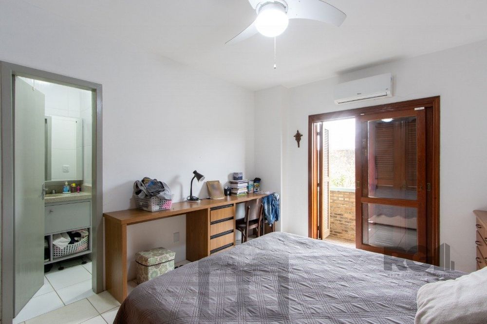 Casa em condomínio com 3 dormitórios, vaga coberta, churrasqueira - Bairro Camaquã — foto 27
