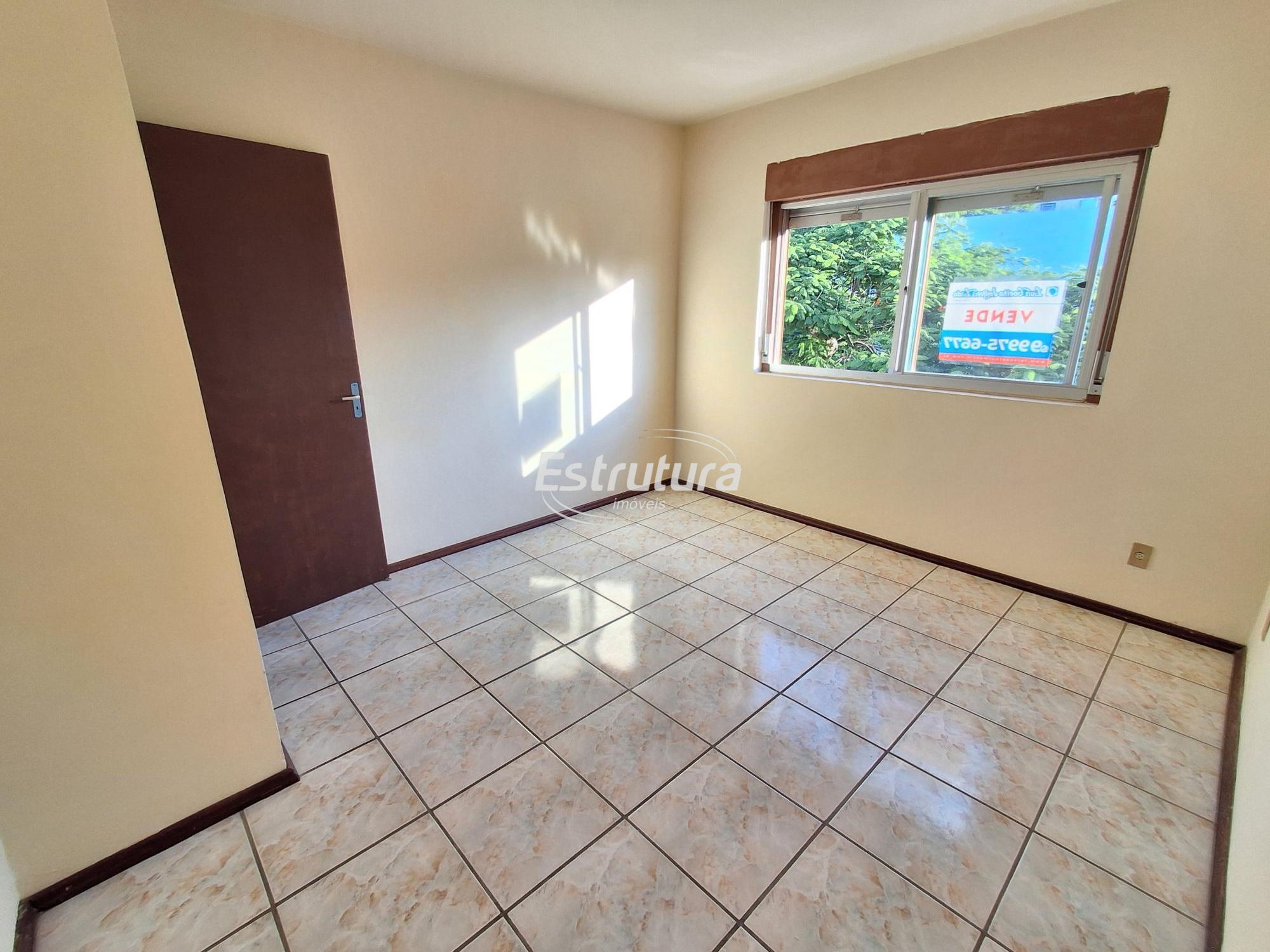 Apartamento Espaçoso: 3 Dormitórios e Suíte em Bairro Central