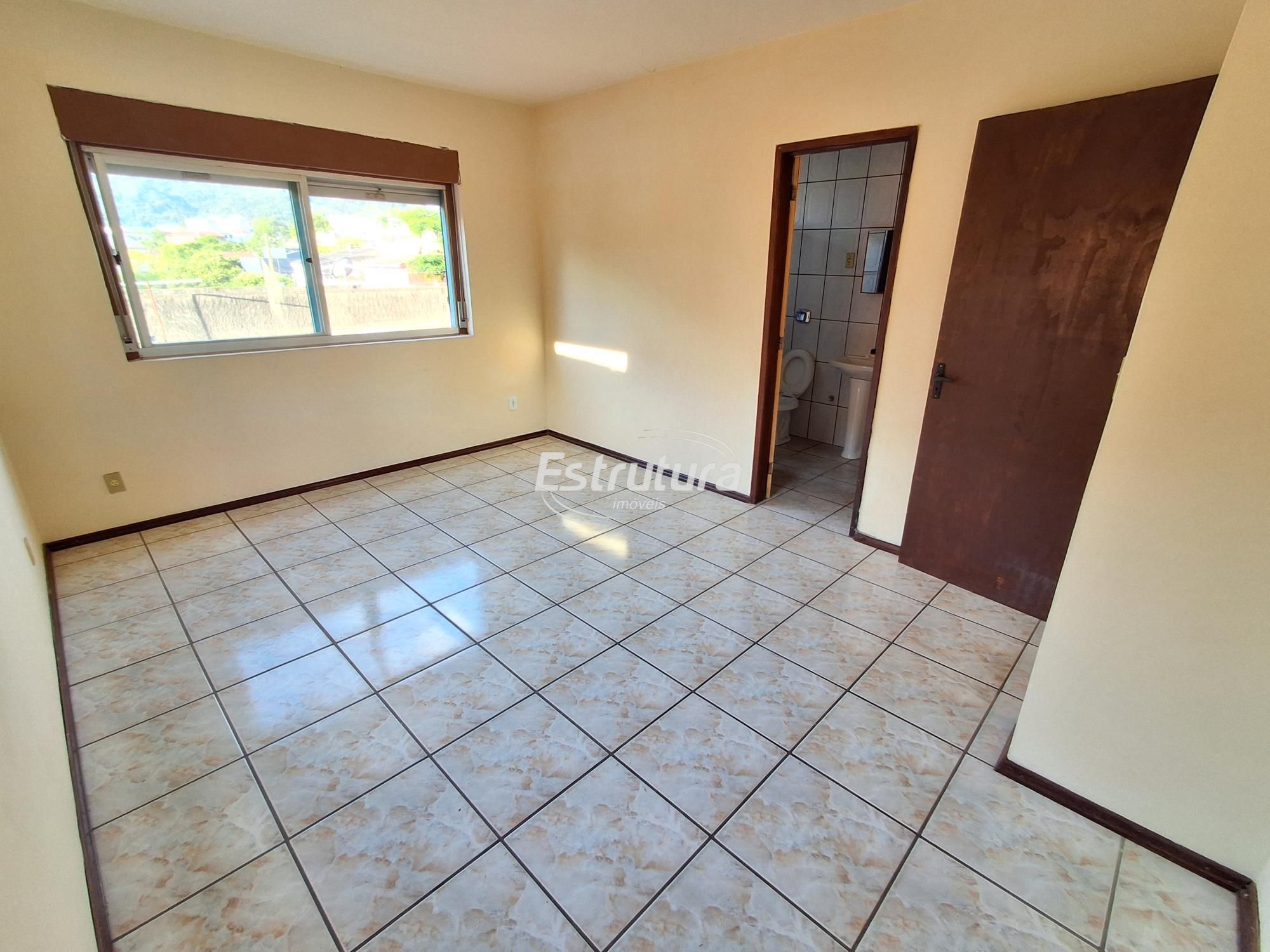 Apartamento Espaçoso: 3 Dormitórios e Suíte em Bairro Central