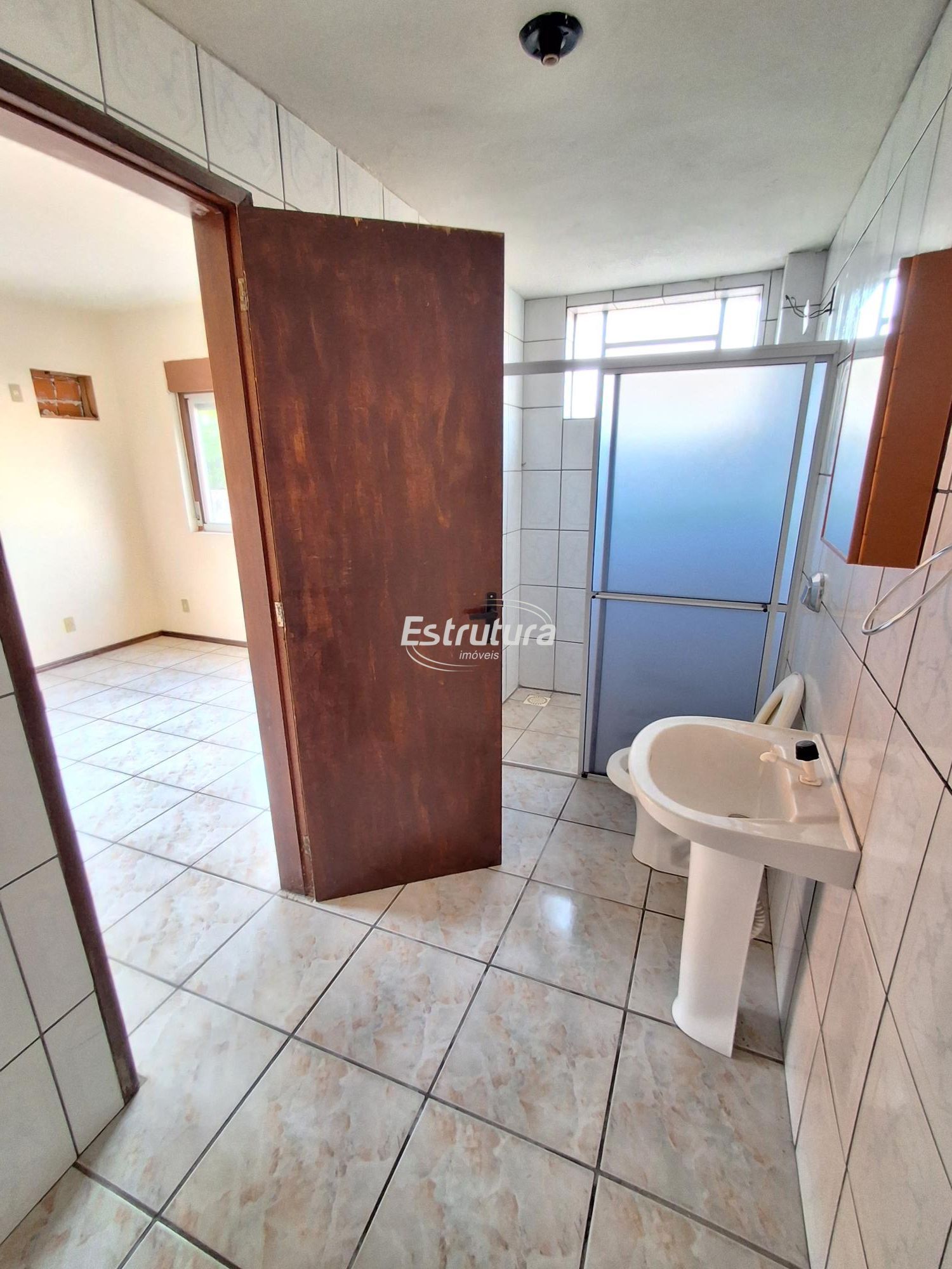 Apartamento Espaçoso: 3 Dormitórios e Suíte em Bairro Central