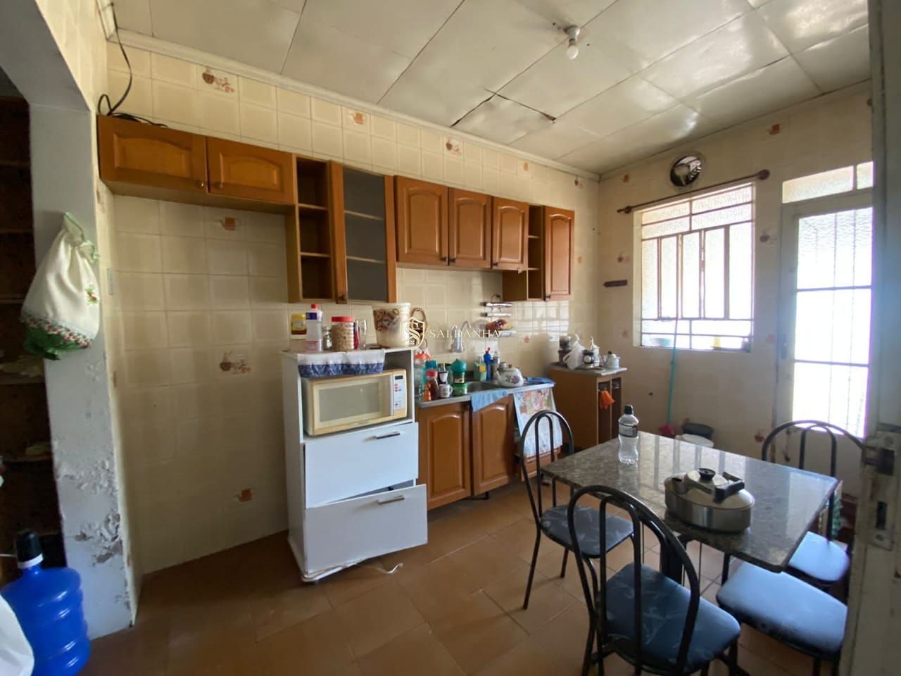 Casa ampla com 4 dormitórios e terreno de 513 m² no Centro